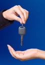 Hand giving key Royalty Free Stock Photo