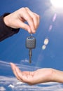 Hand giving key - concept Royalty Free Stock Photo