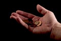 Hand Giving Pennies Royalty Free Stock Photo