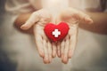 Hand giving red heart for help blood donation healthcare together share love to fight disease concept