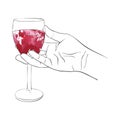 Hand with glass of red wine Royalty Free Stock Photo
