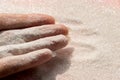 Hand with glitter sand - pastel pink glitter background Royalty Free Stock Photo