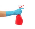 Hand in glove holding red plastic spray bottle. Royalty Free Stock Photo