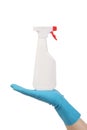 Hand in glove holding white plastic spray bottle Royalty Free Stock Photo