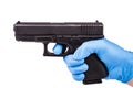 Hand in glove keeps handgun