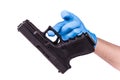 Hand in glove keeps handgun