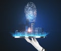 Hand in a glove with a plate holding a city view hologram on a blue background. Internatonal business and market concept