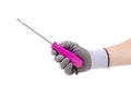 Hand in glove with purple screwdriver. Royalty Free Stock Photo