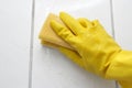 Hand in glove with sponge Royalty Free Stock Photo