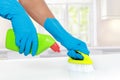 Hand with glove using cleaning brush to clean up Royalty Free Stock Photo