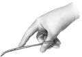 Hand - Gloved with Surgical Hemostat