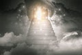 The hand of God and stairway to travel to the gates of heaven and the light of hope, the background is brightness and rainy sky Royalty Free Stock Photo