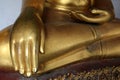 Hand of Golden Buddha statue stucco in different posture in long corridor of Wat Phra Temple, Bangkok, Thailand Royalty Free Stock Photo