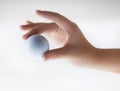 Hand with golf-ball Royalty Free Stock Photo