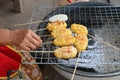 Grilling Khao jee or Grilled sticky rice with egg