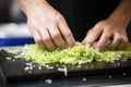 hand grating fresh wasabi onto sushi Royalty Free Stock Photo