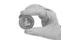 Hand in gray Glove holds Litecoin Crypto Currency.Mining concept. Royalty Free Stock Photo