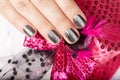Hand with gray manicured nails Royalty Free Stock Photo