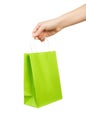 Hand with green bag isolated on white background Royalty Free Stock Photo