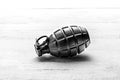 Hand grenade with the pin in Royalty Free Stock Photo