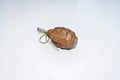 The hand grenade on a white background close-up Royalty Free Stock Photo