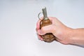 The hand grenade on a white background close-up Royalty Free Stock Photo