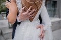 Hand of the groom on the back of the bride Royalty Free Stock Photo