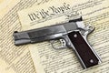 Hand Gun and Constitution Royalty Free Stock Photo