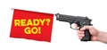 Hand gun with Go flag Royalty Free Stock Photo