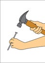 Hand with hammer hammering in a nail