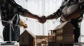 Hand in hand between project contractors and customers due to negotiation of expenses and investments, construction and Royalty Free Stock Photo