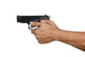 A hand with handgun thumb forward position gripping Royalty Free Stock Photo