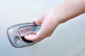 Hand on handle. Close-up of man in formalwear opening a car door Royalty Free Stock Photo