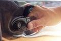 Hand on handle Close up of man hand opening car door Royalty Free Stock Photo