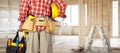 Hand of handyman with a tool bag. Royalty Free Stock Photo