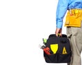 Hand of handyman with a tool bag. Royalty Free Stock Photo