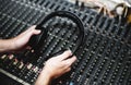 Hand with headphone on sound mixer Royalty Free Stock Photo