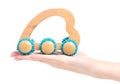 Hand-held massager in hand Royalty Free Stock Photo