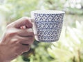 Hand hold Asian Blue and White Vintage Mugs Coffee Tea