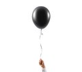 Hand hold blank black balloon mock up isolated. Balloon art.