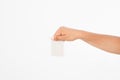 Hand hold blank business card. female arm hold paper isolated on white background. copy space. mock up. Royalty Free Stock Photo