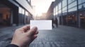 Hand hold blank transparent business card design mockup. Clear calling cards mock up template holding arm. Generative AI