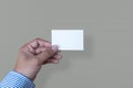 Hand hold blank white card mockup Business branding. Royalty Free Stock Photo