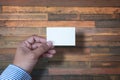 Hand hold blank white card mockup Business branding. Royalty Free Stock Photo