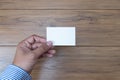 Hand hold blank white card mockup Business branding. Royalty Free Stock Photo