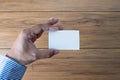 Hand hold blank white card mockup Business branding. Royalty Free Stock Photo