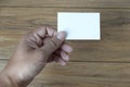 Hand hold blank white card mockup Business branding. Royalty Free Stock Photo