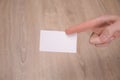 Hand hold blank white card mockup with rounded corners. Plain call-card mock up template holding arm. Plastic credit namecard Royalty Free Stock Photo