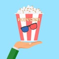 Hand hold bowls, box of popcorn isolated on background. Movies, cinema theater, film concept. Vector design