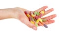Hand hold bunch of colorful sweet jelly worms isolated on white Royalty Free Stock Photo